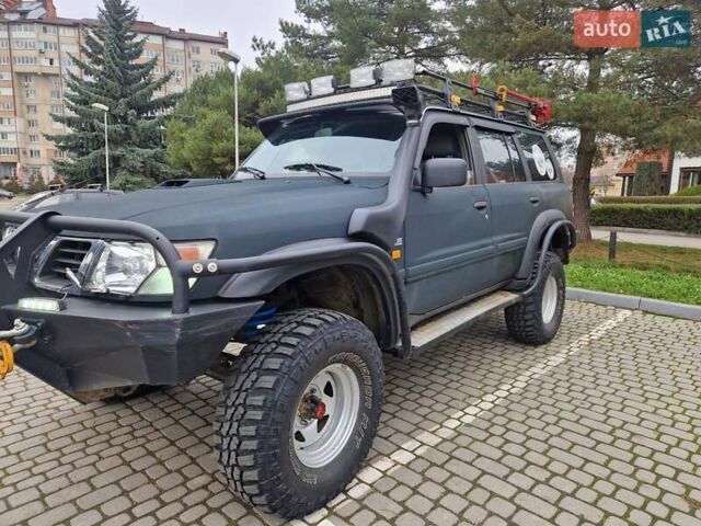 Зелений Ніссан Патрол, об'ємом двигуна 2.8 л та пробігом 198 тис. км за 19999 $, фото 7 на Automoto.ua