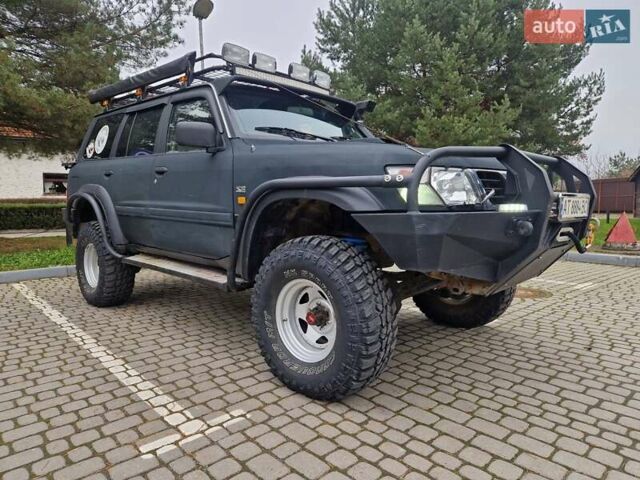 Зелений Ніссан Патрол, об'ємом двигуна 2.8 л та пробігом 198 тис. км за 19999 $, фото 2 на Automoto.ua