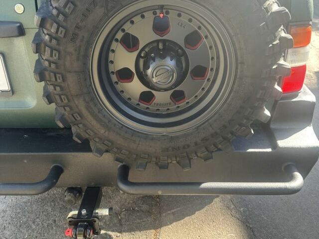 Зеленый Ниссан Патрол, объемом двигателя 4.2 л и пробегом 427 тыс. км за 35000 $, фото 9 на Automoto.ua