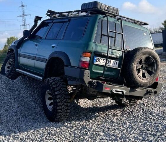 Зелений Ніссан Патрол, об'ємом двигуна 4.5 л та пробігом 150 тис. км за 19700 $, фото 7 на Automoto.ua