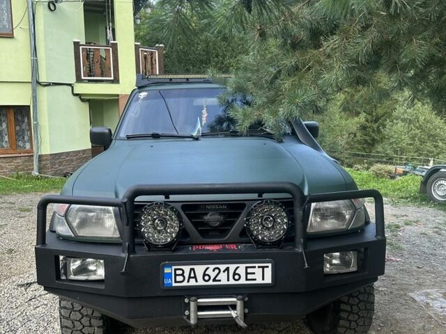 Зеленый Ниссан Патрол, объемом двигателя 4.2 л и пробегом 427 тыс. км за 35000 $, фото 1 на Automoto.ua
