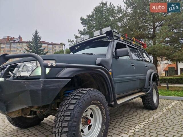 Зелений Ніссан Патрол, об'ємом двигуна 2.8 л та пробігом 198 тис. км за 19999 $, фото 27 на Automoto.ua