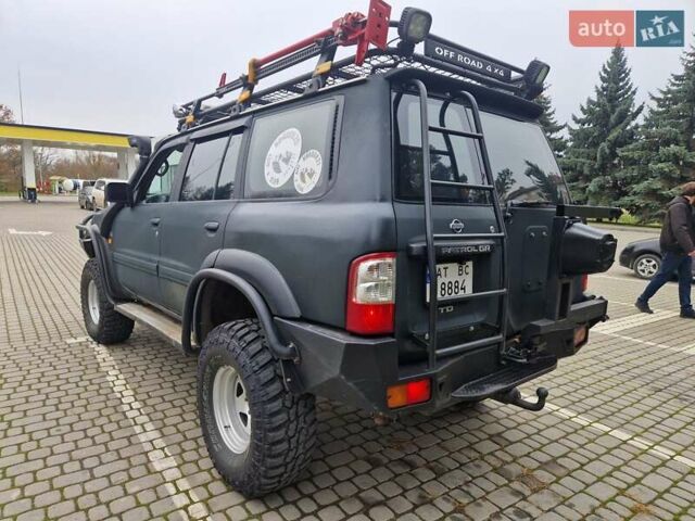 Зелений Ніссан Патрол, об'ємом двигуна 2.8 л та пробігом 198 тис. км за 19999 $, фото 10 на Automoto.ua