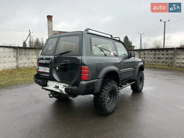 Зелений Ніссан Патрол, об'ємом двигуна 2.83 л та пробігом 254 тис. км за 11800 $, фото 9 на Automoto.ua