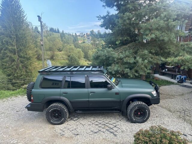 Зеленый Ниссан Патрол, объемом двигателя 4.2 л и пробегом 427 тыс. км за 35000 $, фото 8 на Automoto.ua