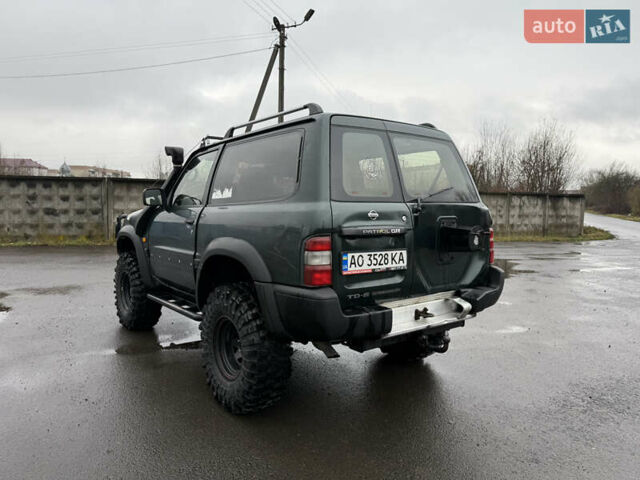 Зелений Ніссан Патрол, об'ємом двигуна 2.83 л та пробігом 254 тис. км за 11800 $, фото 6 на Automoto.ua
