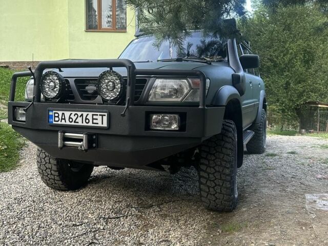 Зеленый Ниссан Патрол, объемом двигателя 4.2 л и пробегом 427 тыс. км за 35000 $, фото 20 на Automoto.ua