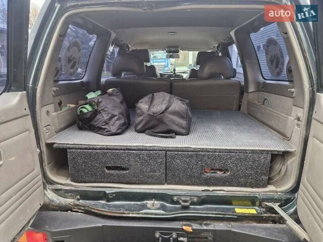 Зелений Ніссан Патрол, об'ємом двигуна 2.8 л та пробігом 198 тис. км за 19999 $, фото 29 на Automoto.ua