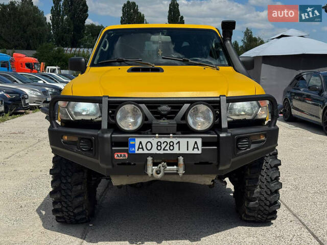 Зеленый Ниссан Патрол, объемом двигателя 4.2 л и пробегом 270 тыс. км за 26800 $, фото 1 на Automoto.ua