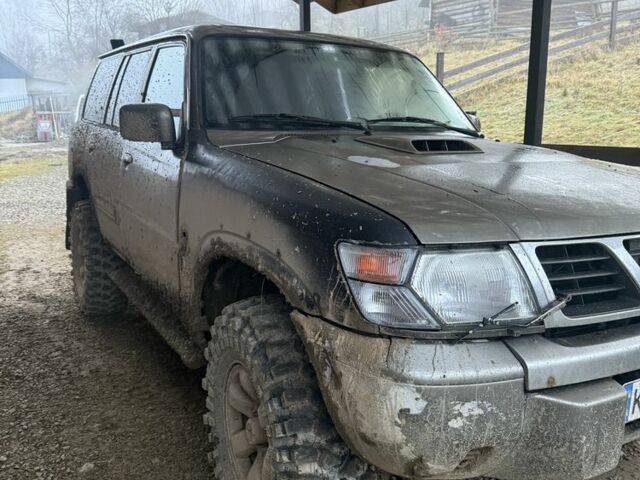 Зеленый Ниссан Патрол, объемом двигателя 2.8 л и пробегом 400 тыс. км за 16000 $, фото 3 на Automoto.ua