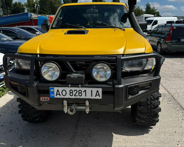 Зеленый Ниссан Патрол, объемом двигателя 4.2 л и пробегом 270 тыс. км за 26800 $, фото 5 на Automoto.ua