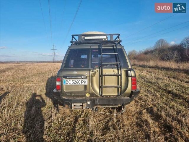 Зеленый Ниссан Патрол, объемом двигателя 2.8 л и пробегом 312 тыс. км за 21500 $, фото 9 на Automoto.ua