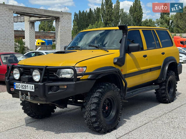 Зеленый Ниссан Патрол, объемом двигателя 4.2 л и пробегом 270 тыс. км за 26800 $, фото 2 на Automoto.ua