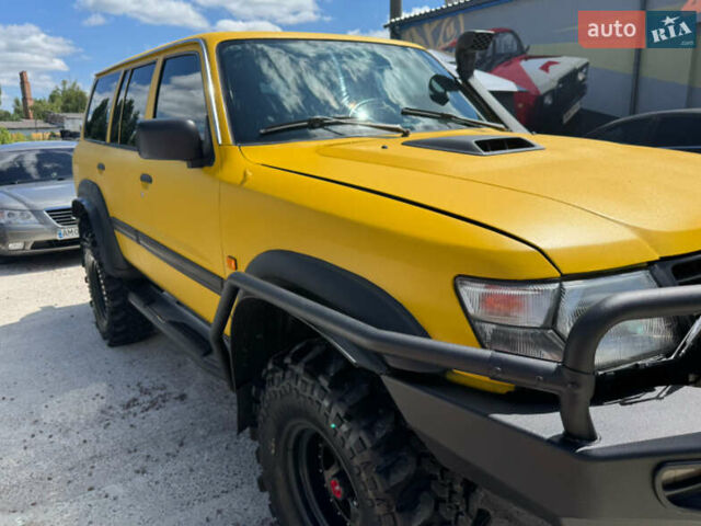 Зеленый Ниссан Патрол, объемом двигателя 4.2 л и пробегом 270 тыс. км за 26800 $, фото 3 на Automoto.ua