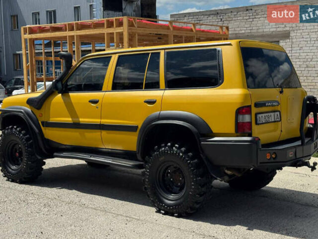 Зеленый Ниссан Патрол, объемом двигателя 4.2 л и пробегом 270 тыс. км за 26800 $, фото 7 на Automoto.ua