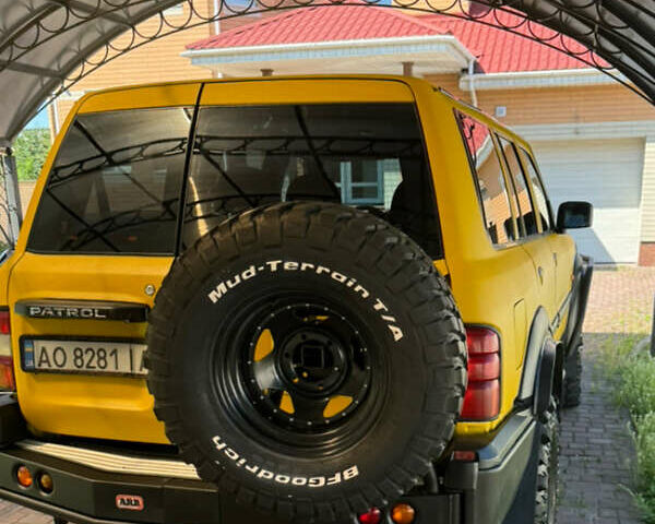 Зеленый Ниссан Патрол, объемом двигателя 4.2 л и пробегом 270 тыс. км за 26800 $, фото 10 на Automoto.ua