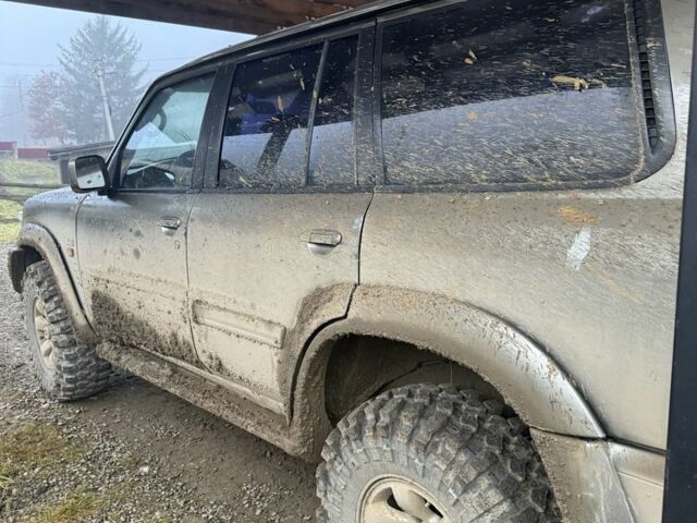 Зеленый Ниссан Патрол, объемом двигателя 2.8 л и пробегом 400 тыс. км за 16000 $, фото 1 на Automoto.ua