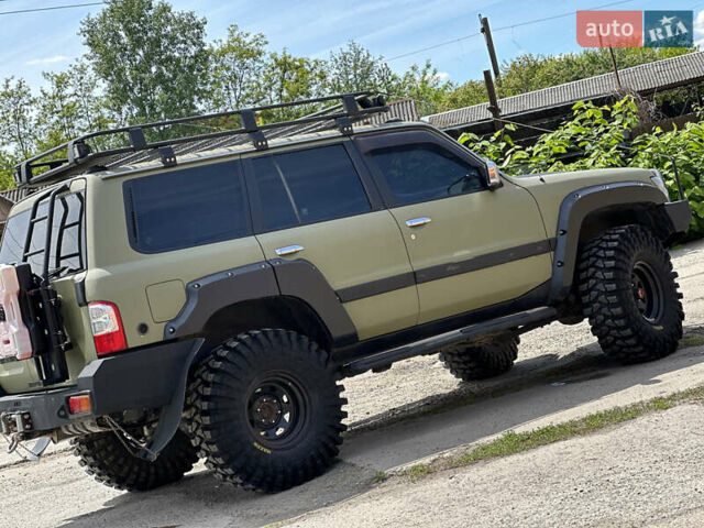 Зелений Ніссан Патрол, об'ємом двигуна 4.5 л та пробігом 356 тис. км за 25500 $, фото 9 на Automoto.ua