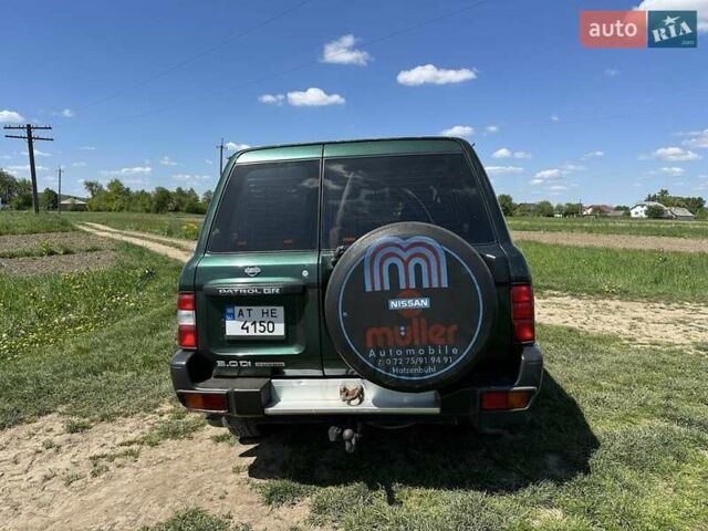 Зелений Ніссан Патрол, об'ємом двигуна 3 л та пробігом 235 тис. км за 17300 $, фото 6 на Automoto.ua