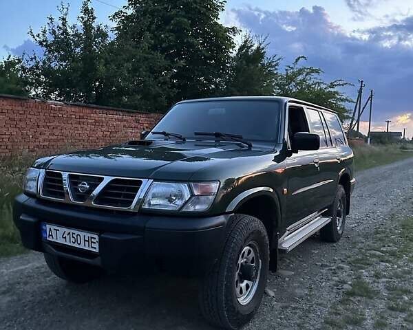 Зелений Ніссан Патрол, об'ємом двигуна 3 л та пробігом 235 тис. км за 17300 $, фото 11 на Automoto.ua
