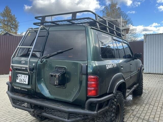Зеленый Ниссан Патрол, объемом двигателя 3 л и пробегом 47 тыс. км за 16000 $, фото 6 на Automoto.ua
