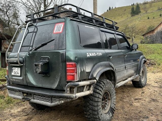 Зеленый Ниссан Патрол, объемом двигателя 3 л и пробегом 47 тыс. км за 16000 $, фото 13 на Automoto.ua
