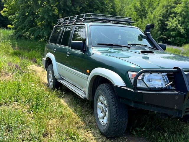 Зелений Ніссан Патрол, об'ємом двигуна 3 л та пробігом 275 тис. км за 11000 $, фото 5 на Automoto.ua