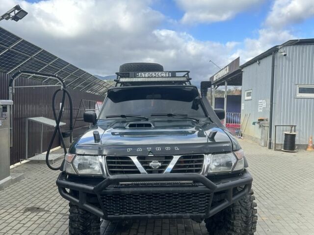 Зеленый Ниссан Патрол, объемом двигателя 3 л и пробегом 47 тыс. км за 16000 $, фото 7 на Automoto.ua