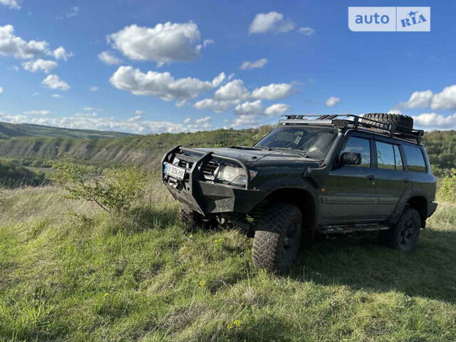 Зелений Ніссан Патрол, об'ємом двигуна 3 л та пробігом 315 тис. км за 15300 $, фото 1 на Automoto.ua