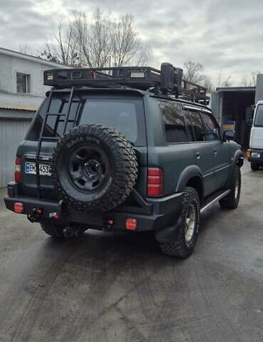 Зеленый Ниссан Патрол, объемом двигателя 2.95 л и пробегом 350 тыс. км за 27900 $, фото 2 на Automoto.ua