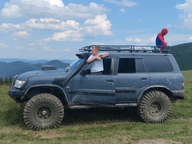 Зеленый Ниссан Патрол, объемом двигателя 2.8 л и пробегом 200 тыс. км за 23000 $, фото 2 на Automoto.ua