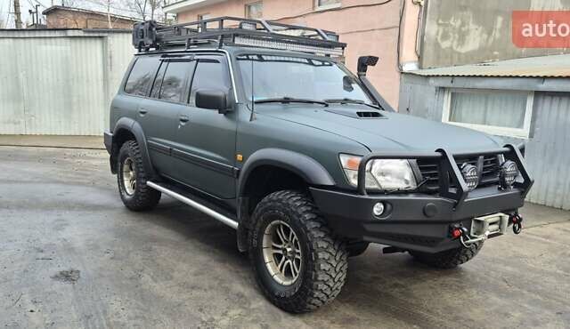 Зеленый Ниссан Патрол, объемом двигателя 2.95 л и пробегом 350 тыс. км за 27900 $, фото 9 на Automoto.ua