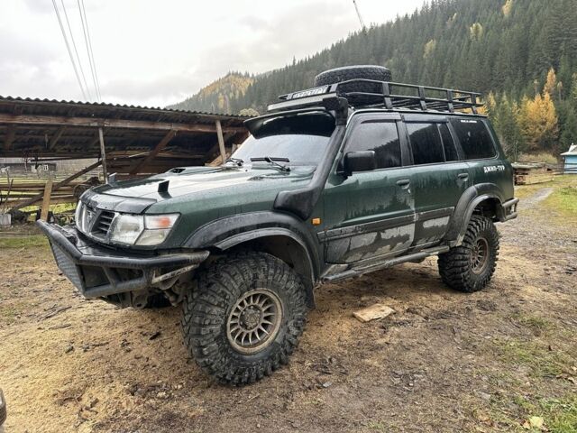 Зеленый Ниссан Патрол, объемом двигателя 3 л и пробегом 47 тыс. км за 16000 $, фото 12 на Automoto.ua