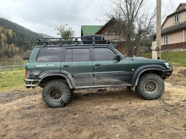 Зеленый Ниссан Патрол, объемом двигателя 3 л и пробегом 47 тыс. км за 16000 $, фото 11 на Automoto.ua