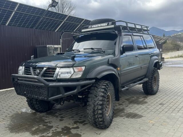 Зеленый Ниссан Патрол, объемом двигателя 3 л и пробегом 47 тыс. км за 16000 $, фото 9 на Automoto.ua