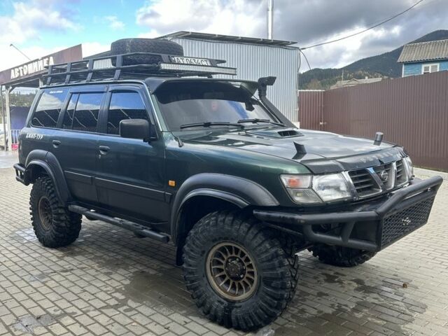 Зеленый Ниссан Патрол, объемом двигателя 3 л и пробегом 47 тыс. км за 16000 $, фото 8 на Automoto.ua