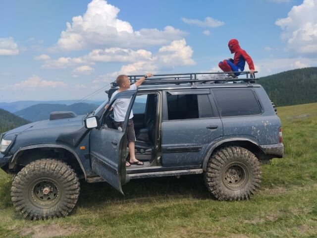 Зеленый Ниссан Патрол, объемом двигателя 2.8 л и пробегом 200 тыс. км за 23000 $, фото 3 на Automoto.ua