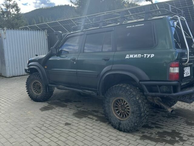 Зеленый Ниссан Патрол, объемом двигателя 3 л и пробегом 47 тыс. км за 16000 $, фото 4 на Automoto.ua