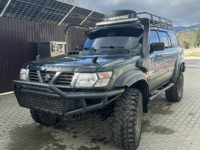 Зеленый Ниссан Патрол, объемом двигателя 3 л и пробегом 47 тыс. км за 16000 $, фото 2 на Automoto.ua