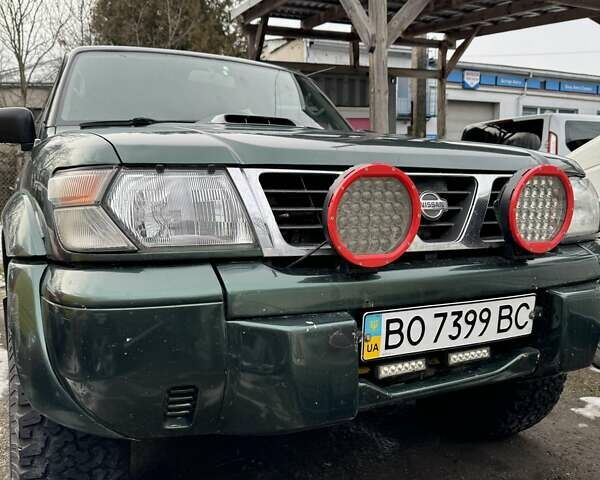 Зеленый Ниссан Патрол, объемом двигателя 3 л и пробегом 377 тыс. км за 15500 $, фото 9 на Automoto.ua