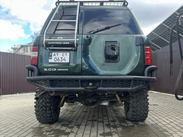 Зеленый Ниссан Патрол, объемом двигателя 3 л и пробегом 47 тыс. км за 16000 $, фото 5 на Automoto.ua