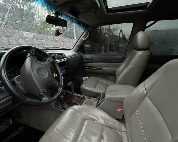 Зелений Ніссан Патрол, об'ємом двигуна 3 л та пробігом 446 тис. км за 15000 $, фото 19 на Automoto.ua