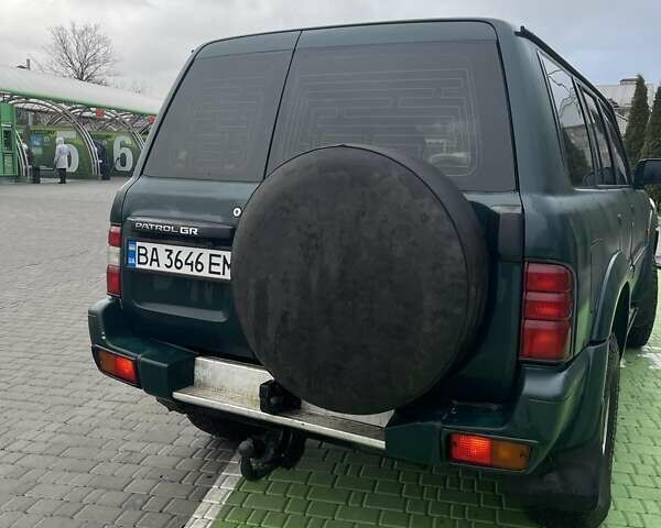 Зелений Ніссан Патрол, об'ємом двигуна 3 л та пробігом 446 тис. км за 15000 $, фото 8 на Automoto.ua