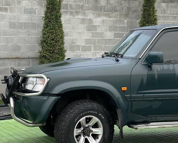 Зелений Ніссан Патрол, об'ємом двигуна 3 л та пробігом 446 тис. км за 15000 $, фото 10 на Automoto.ua