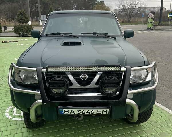 Зелений Ніссан Патрол, об'ємом двигуна 3 л та пробігом 446 тис. км за 15000 $, фото 5 на Automoto.ua