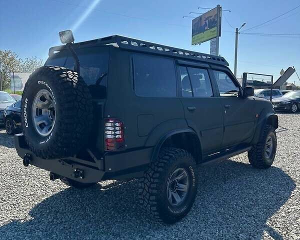 Зеленый Ниссан Патрол, объемом двигателя 2.95 л и пробегом 333 тыс. км за 25000 $, фото 8 на Automoto.ua