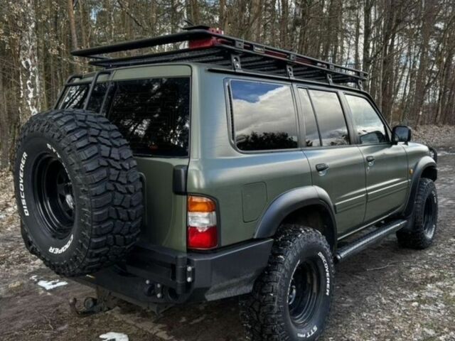 Зелений Ніссан Патрол, об'ємом двигуна 3 л та пробігом 205 тис. км за 4750 $, фото 4 на Automoto.ua