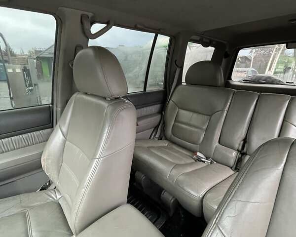 Зелений Ніссан Патрол, об'ємом двигуна 3 л та пробігом 446 тис. км за 15000 $, фото 18 на Automoto.ua