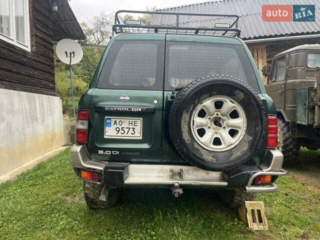 Зеленый Ниссан Патрол, объемом двигателя 2.95 л и пробегом 300 тыс. км за 9800 $, фото 10 на Automoto.ua