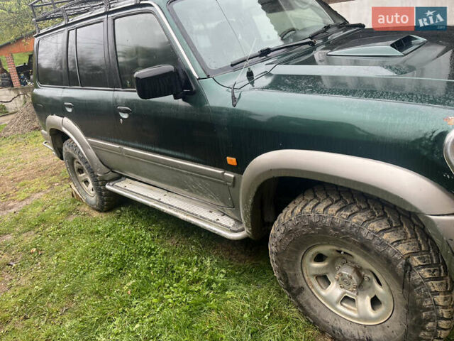 Зеленый Ниссан Патрол, объемом двигателя 2.95 л и пробегом 300 тыс. км за 9800 $, фото 3 на Automoto.ua